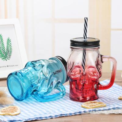 China Mason Jar With Handle Beer Glass Cup Beverage Skull Glass Beverage Bottle for sale