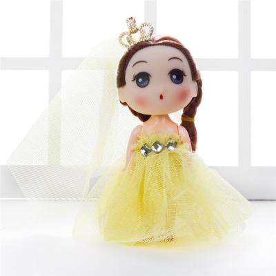 China New Promotion Gift Small Doll 12cm Eco-friendly Cheap Plastic Doll Children's Toy Mini Key Chain for sale