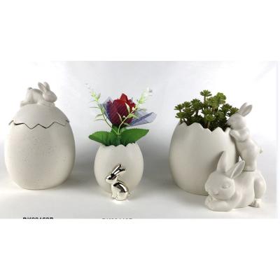 China Minimalist Amazon Cute Craft Easter Bunny Statue Ceramic Colorful Ceramic Decorative Egg Shaped Candy Jar Bunny Cover for sale