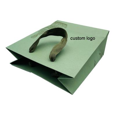 China Recycled Materials Factory Logo Fabric Shoes Custom Paper Shopping Bags for sale