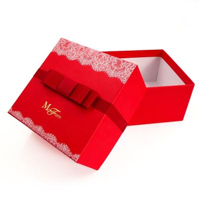 China Custom Recyclable Luxury Printed Paper Lid Cardboard Ribbon Removable Packaging Boxes With Logo For Clothing for sale