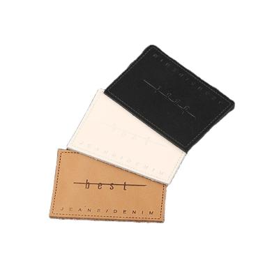 China Fashion Viable Custom Free Sample New Design Low Price Heat Press Logo Real Leather Patches Labels For Clothes for sale