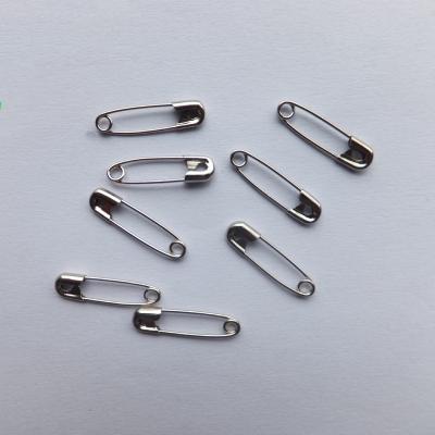 China Garment Tag Custom Fashion Logo Free Sample New Design 22Mm Plated Metal Small Feet Silver Safety Pin for sale