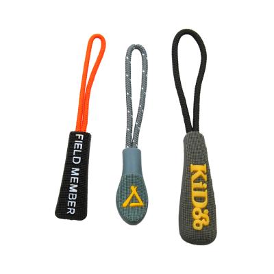 China New Design Custom Low Price Free Sample PVC Fashion 3D Rubber Zipper Puller With Different Logo Design for sale