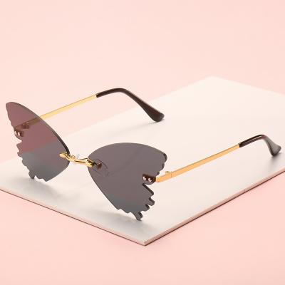 China Trendy Sunglasses Colorful Rimless Funny Shades Designer Women Butterfly Sun Glasses Fashion Sunglasses New for sale