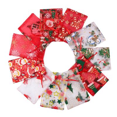 China Recyclable Christmas Tanning Gauze Storage Bag Drawstring Bag Snowflake Star Gauze Bag Santa Claus Elk for sale