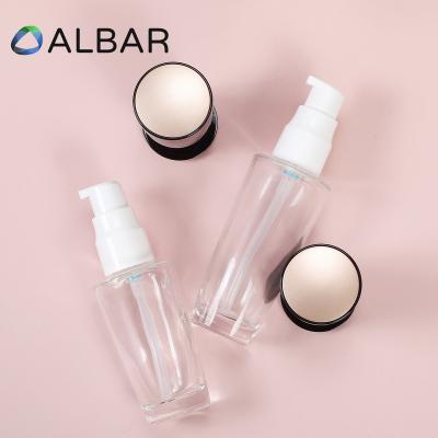 China 80 100ml 120ml Eco-friendly Recyclable Cosmetics Upright Glass Bottles For Face Emulsion And Lotion Serum In Light Gold Caps for sale