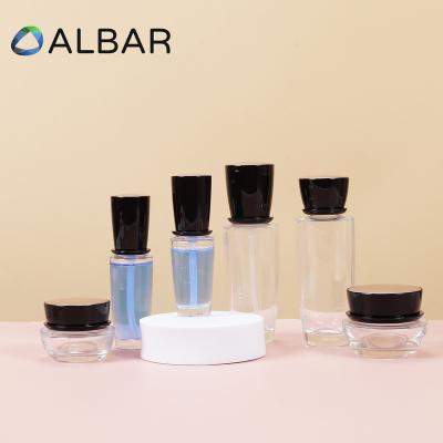 China 30ml 50ml 100ml Eco-friendly Recyclable Cosmetics Amber Glass Jars For Body Black Caps Amber Glass Jars For Body Care And Skin Care With Inner Lids Cover Cap for sale