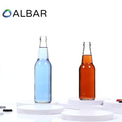 China Eco-Friendly Recyclable Tequila Soft Drink Empty Round Clear Brew Beer Juice Cola Beverage Glass Bottles With Crown Caps Rubber Stopper for sale