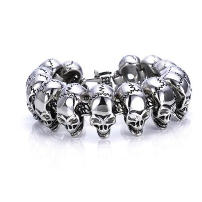 China Antioxidation Men Silver 316L Metal Stainless Steel Bracelet Men Gold Silver Skull Skeleton Head Magnetic Bracelet for sale