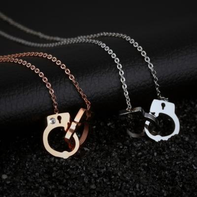 China Fashion 316l Stainless Steel Handcuff Mini Pendant Unique Necklace For Women Mini Pendant Necklace for sale