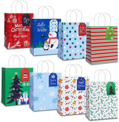 China Recyclable Christmas New Year Holiday Party Gift Giving 13 Inch Christmas Bulk Gift Paper Bags With Tags Christmas Candy Bags With Handle for sale