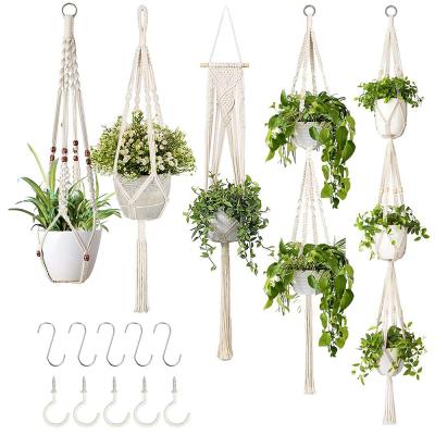 China Macrame Plant Bohemian Hangers with Different Handmade Cotton Rope Rows Hooks Hanging Planters Set Flower Pots Rack Home Decor for sale