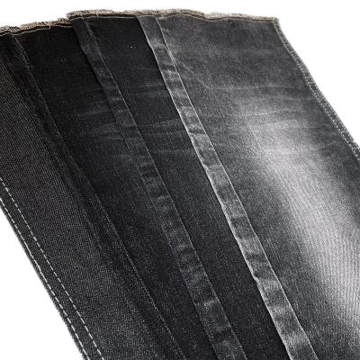 China Breathable Manufacturer Recommended Cost Effective Black 10.7oz TR Stretch Cotton Roving Denim Fabric For Jeans for sale