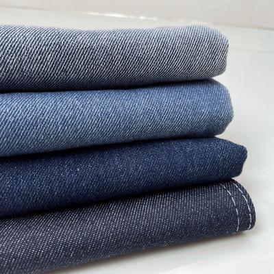 China Factory Hot Selling Breathable 9.8 Oz Dark Blue TC Jeans Fabrics For Shirts And Pants for sale