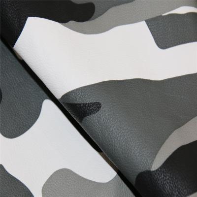 China Hot Sale Fashion Waterproof Camouflage Design Printing Rayon Backing PU Leather For Jacket And Skirt for sale