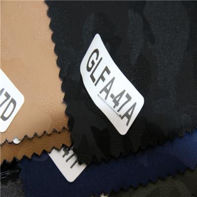 China Very popular wind proof thickness0.6-0.65MM rayon backing pu to face fabric for man's jacket or other daily ues items for sale