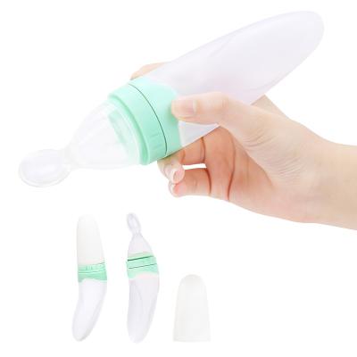 China Hot Selling BPA Free Sample Silicone Baby Soft Fruit Fruit Food Feeding Bottle BPA Free With Spoon for sale