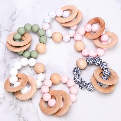 China Odorless& Non-toxic& Wholesale Hot Sale China Manufacturer BPA Free Wooden Teething Ring Toys Funny Silicone Baby Teether Teether From China for sale