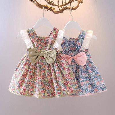 China Europe and America Ins2022 new summer girl's chest bow dress broken flowers baby flying sleeve princess dress children's dress for sale