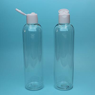 China 250ML PACKAGING Clear Round BEAUTY Plastic Bottle Boston With Flip Top Plastic Caps for sale