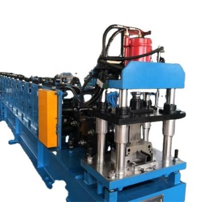 China Hotels Shutter Door Guide Rail Roll Forming Machine Drive By 15KW Chain Main Power for sale