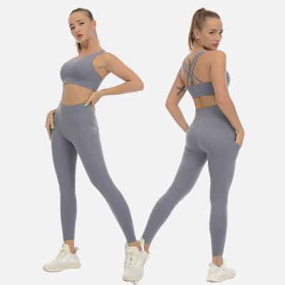 China Workable Lady Sports Bra Women's Sling Yoga Leggings High-waisted Two-Piece Stretch Fitness Suit for sale