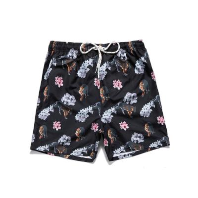 China QUICK DRY summer plus size new men's beach shorts vacation leisure pants printed leisure short pants for sale