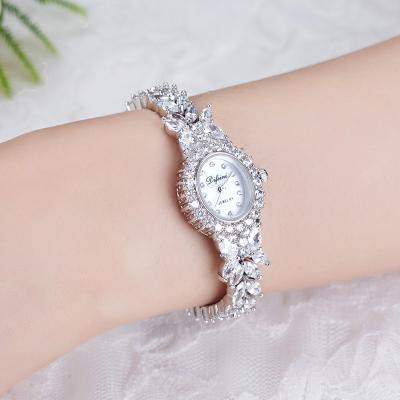 China Water Resistant Fashion Luxury Brass Bracelet Women Watches Quartz Casual Ladies Watch for sale