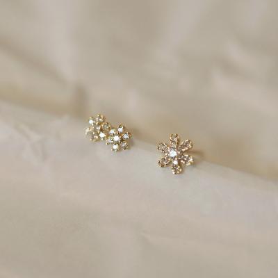 China ANENJERY FASHIONABLE Mini Zircon Flower Stud Earrings Asymmetrical For Women Small Gold Plated Earrings for sale