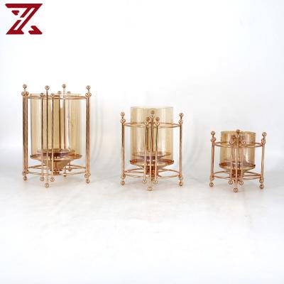 China Home decoration living room simple design metal candle holder gold candlesticks for home decor for sale