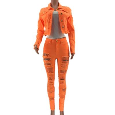 China Anti-Static Two Piece Long Sleeve Neon Orange Ripped Jacket And Pants Suits For Women for sale