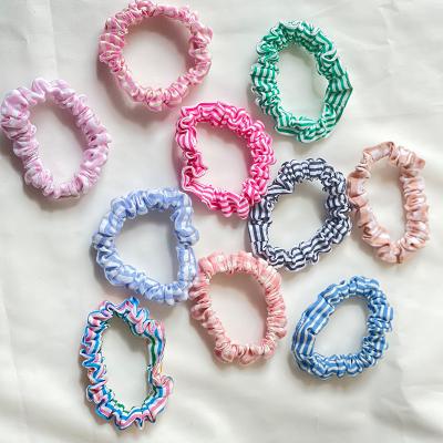 China Fashion Design Hair Accessories Fashion Design Hair Ring Plastics Scrunchie Korean Cute Elastic Hair Tie Label Cute Hair Tie for sale