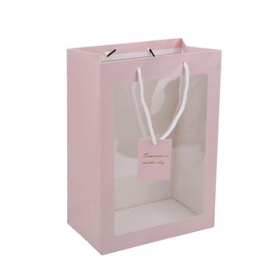 China Recyclable Customizable White Luxury Perfume Crafts Luxury Crafts Clothing Boutique Cardboard Printing Gift Shopping Packaging Paper Bags for sale