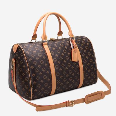 China Large Capacity Vintage Mens and Womens Travel Bags Luxury Brand Unisex Travel Shoulder Messenger Bags Handbags Women Bags Designer for sale