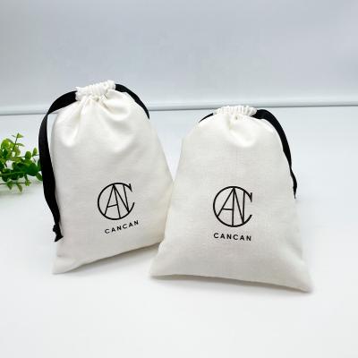 China Custom Printed Recyclable Organic Cotton Canvas Drawstring Pouch Cheap Large Dust Bag With Satin Ribbon for sale