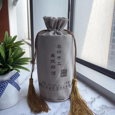 China Recyclable Tasseled Velvet Wine Bottle Pouch Bag for sale