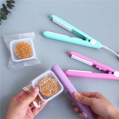 China Easy Hot Creative Vacuum Sealer Food Vending Operation Portable Bag Cuts Mini Electric Heat Sealing Machine Handheld Plastic Gasket Sealer for sale