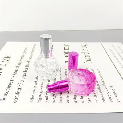 China Custom Glass Cosmetic Special Shaped Perfume Bottles 10ml With Sprayer for sale