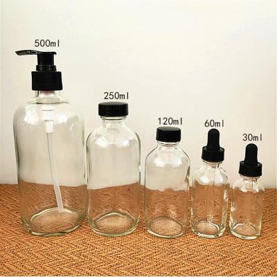 China Personal Care 500ml Clear Round Boston Spray Glass Bottle For Home With Sprayer for sale