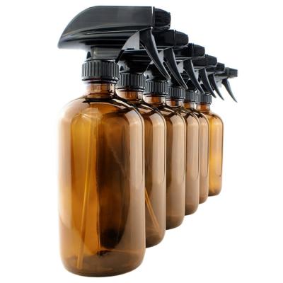 China Personal Care 16oz Amber Glass Spray Bottles Boston Round Bottles With Stream Sprayers for sale