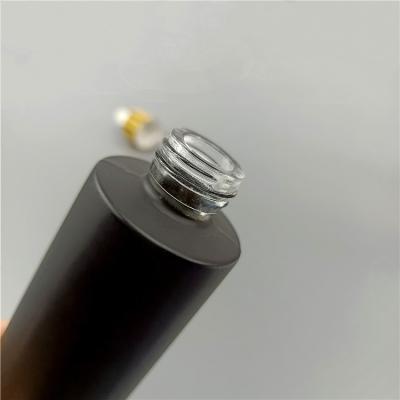 China 1oz 2oz Matte Black Serum Glass Dropper Essential Oil Glass Cosmetic Bottle with Dropper for sale