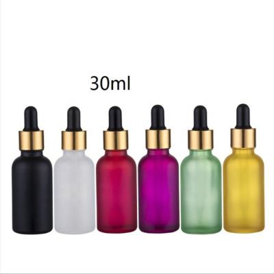 China Personal Care 1 Ounce Colored Glass Dropper Bottle For Serum Essential Oil for sale