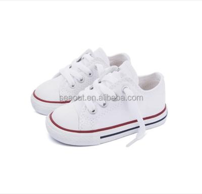 China 2018 latest spring non-slip and durable wholesale kids hide white canvas shoes on sale for sale