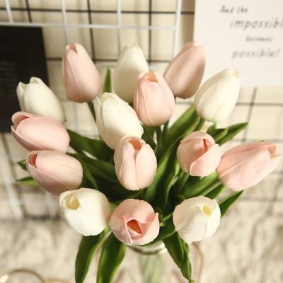 China Natual Contact Guaranteed Wholesale Price 14 Color Quality PU Mini Tulip Artificial Flower Suitable Wedding Home Decor for sale