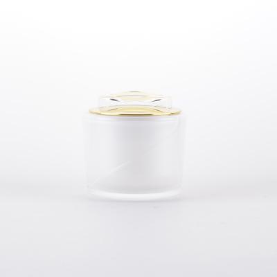 China Luxury Shiny Cosmetic Container Jar Gold Skin Care Cream Packaging 50g Acrylic Jar With Clear Crystal Cap for sale