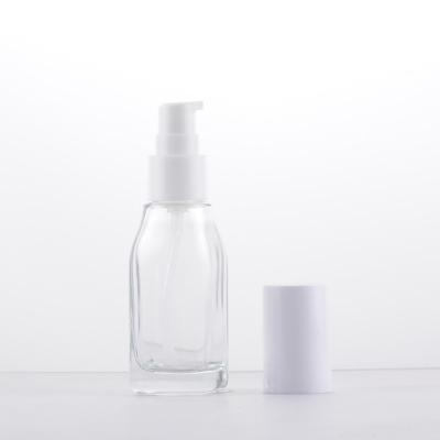 China Personal Care China Cosmetics 40ml Clear Glass Containers And Lotion Packaging Glass Bottles With Pump for sale