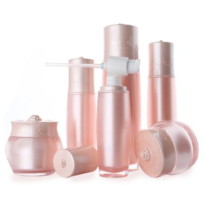 China Rose Cosmetic Acrylic Vintage Packaging Flower Cosmetic Bottle And Jars With Pump for sale