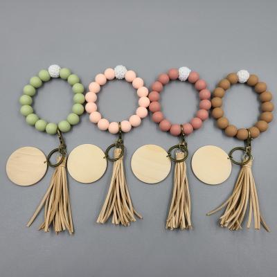 China 2022 romantic the new bracelet hook of the bead bracelet silicone bead macrame tassel key chain for sale