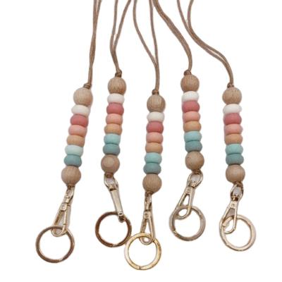 China Fashion Cute Teacher Badge Holder Smiley Pattern Tag Keychain Necklace six colors silicone beads wooden beads tassel beaded lanyard for sale